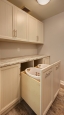 Laundry Room with Pull Out Hampers