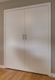 Reach In Closet Doors in White Finish